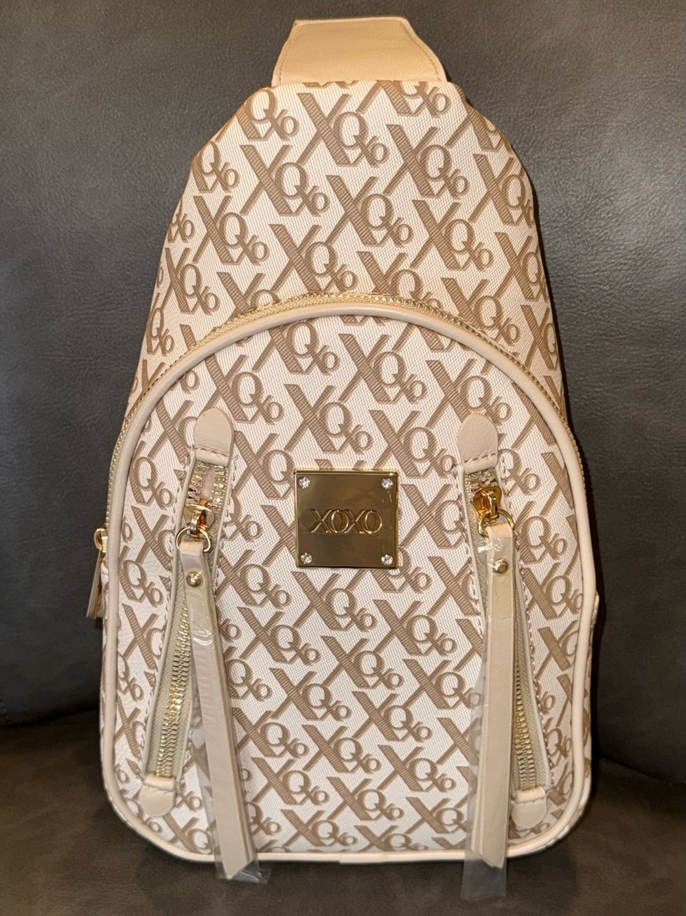 XOXO Luxe Sling Bag - NWT Tan  and Cream logo design